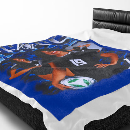Katie Reyes 60"-80" Plush Blanket