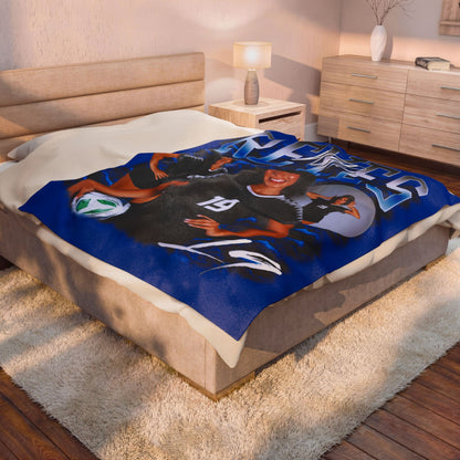 Katie Reyes 60"-80" Plush Blanket
